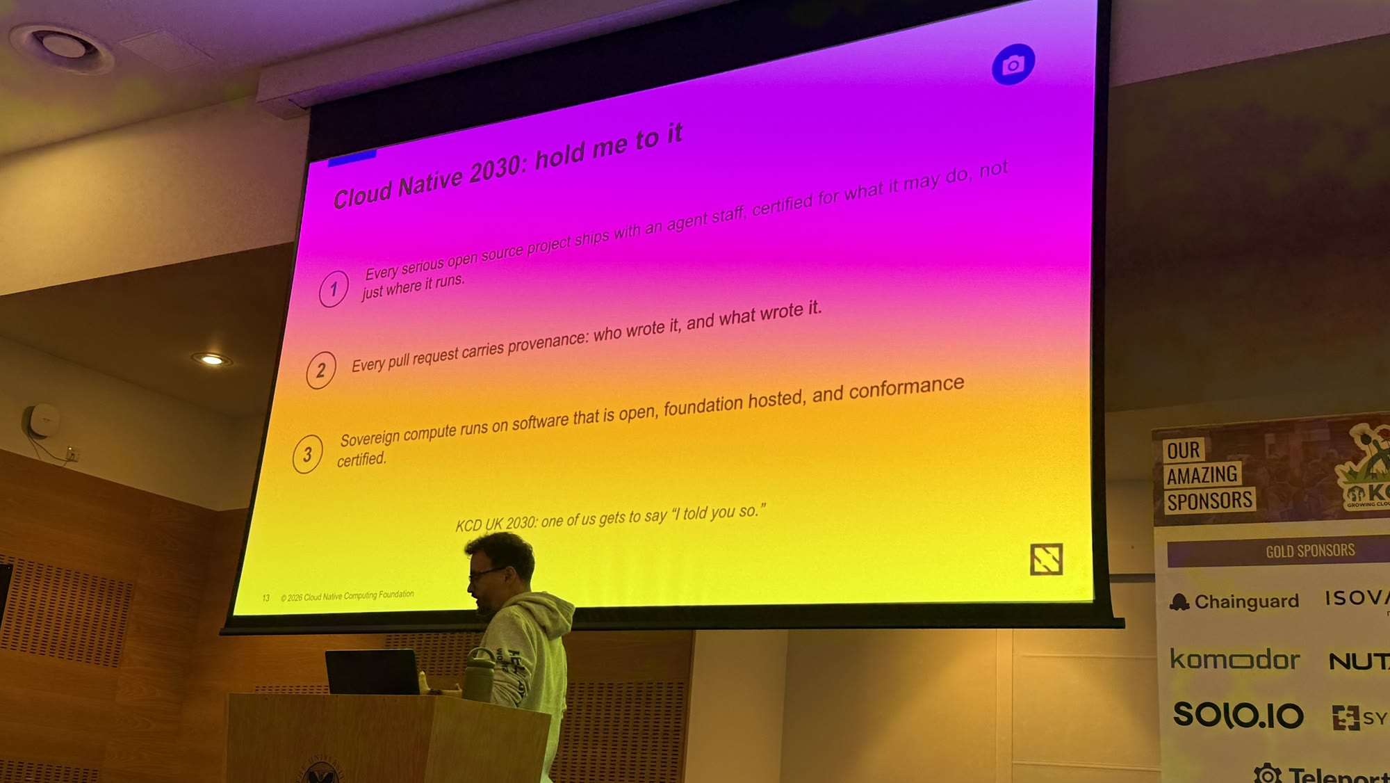 Ihor Dvoretskyi next to a slide titled Cloud Native 2030: hold me to it, with three predictions