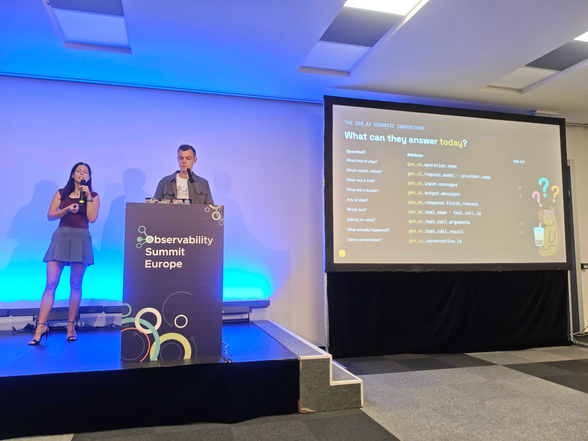 Adriana speaking next to a slide titled The gen_ai semantic conventions: what can they answer today, mapping questions like which tool or what actually happened to gen_ai attributes, several of them opt-in