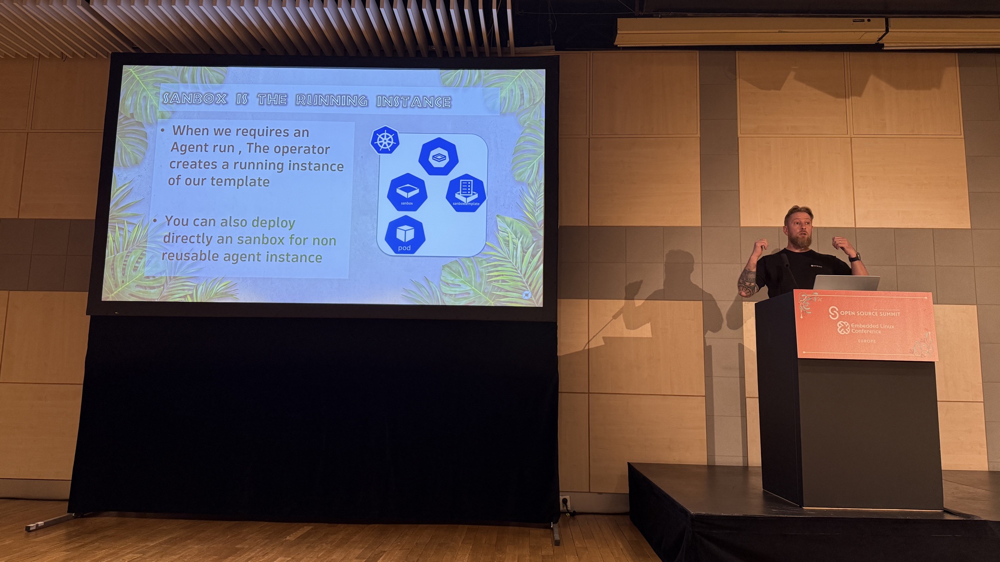 Henrik next to a slide explaining that a Sandbox is the running instance of a SandboxTemplate