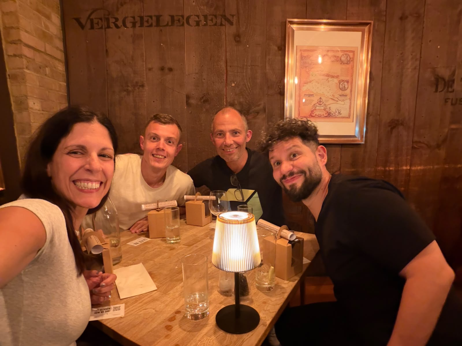 Adriana, Kasper, Andreas Grabner and Mauricio Salatino around a restaurant table