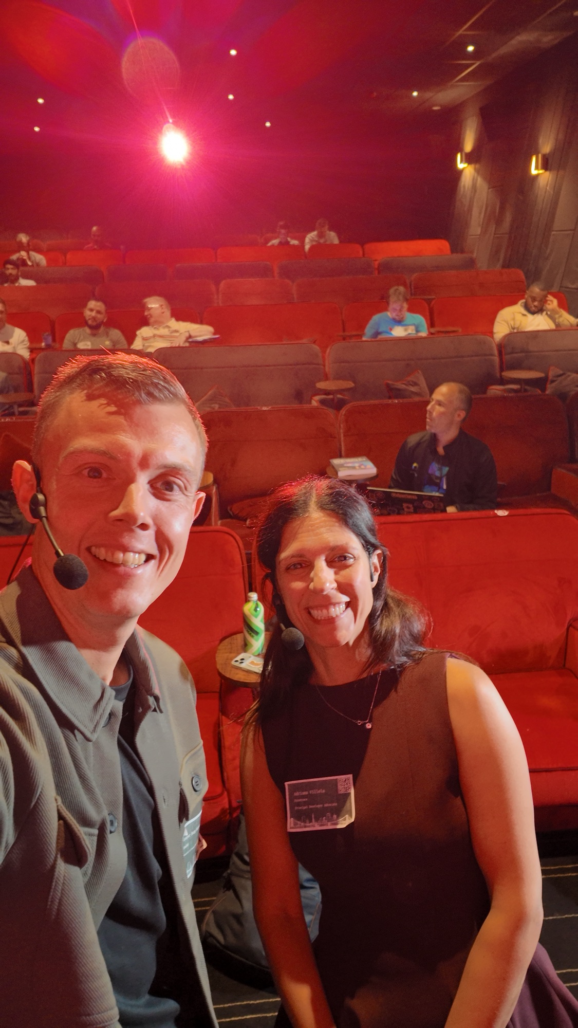 Kasper and Adriana taking a selfie in front of the audience in the cinema seats